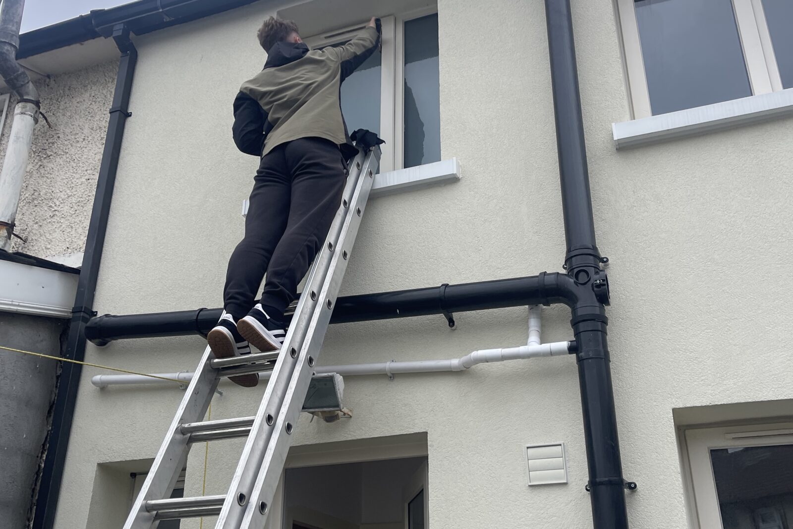 Gutter clearing and fascia wash